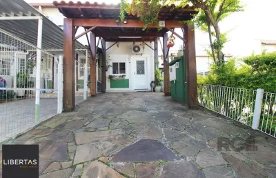 Sobrado com dois dormitórios e uma vaga de garagem próximo ao zaffari da juca batista no bairro da hípica em porto alegre.