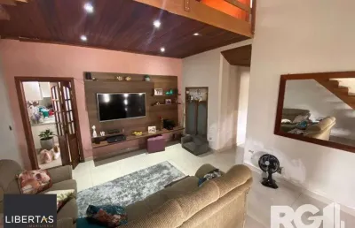 Casa com 2 quartos à venda na Avenida Edgar Pires de Castro, 4718, Lageado, Porto Alegre