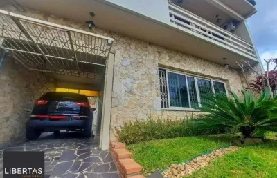 Excelente casa com 3 dormitórios e 3 vagas de garagem