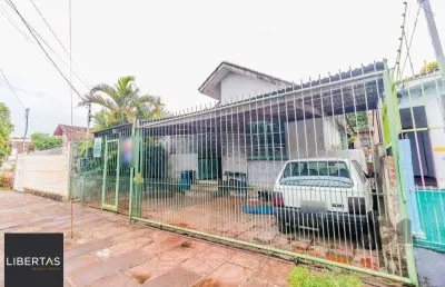Casa com 2 quartos à venda na Rua Guadalajara, 855, Jardim Itu Sabará, Porto Alegre