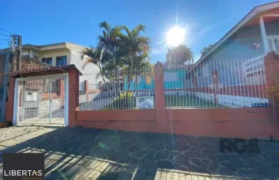 Casa com 3 quartos à venda na Rua Tropeiro, 242, Campo Novo, Porto Alegre