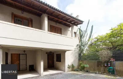 Casa em condomínio fechado com 2 quartos à venda na Avenida Guarujá, 126, Guarujá, Porto Alegre