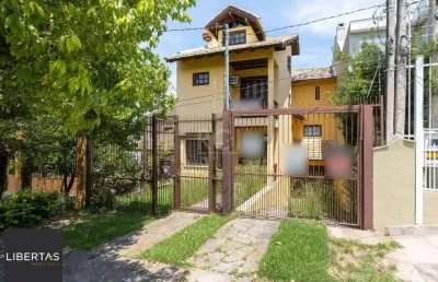 Casa com 3 quartos à venda na Rua Josué Guimarães, 177, Espírito Santo, Porto Alegre