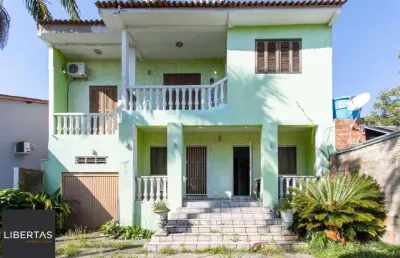 Casa com 3 quartos à venda na Avenida da Serraria, 820, Espírito Santo, Porto Alegre