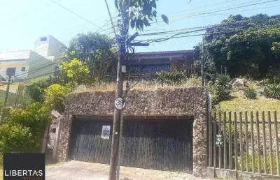Casa com 5 quartos à venda na Rua Alcebíades Antônio dos Santos, 260, Nonoai, Porto Alegre