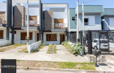 Casa com 3 quartos à venda na Rua Manoel Fernandes, 78, Guarujá, Porto Alegre