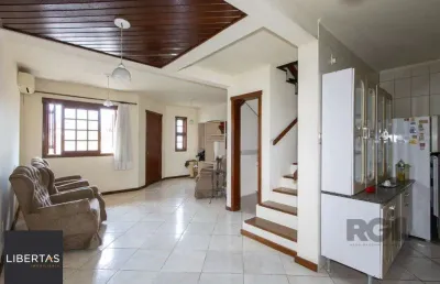 Casa em condomínio na zona sul, no bairro hípica, com 2 dormitórios, living para dois ambientes, cozinha mobiliada, lavabo
