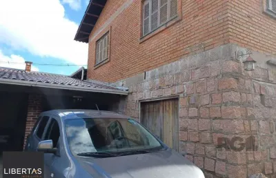 Casa com 3 quartos à venda na Estrada João Passuelo, 1100, Vila Nova, Porto Alegre