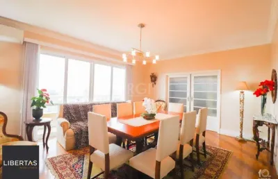Apartamento á venda com 3 dormitórios com 1 suíte com sacada + 2 sacadas na sala e living, 233,85m²  e 1 vaga de garagem escriturada e coberta, no bairro independência em porto alegre.