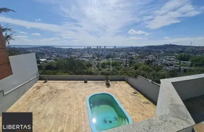 Casa para venda - 464m², 5 dormitórios, sendo 4 suites, 4 vagas - nonoai