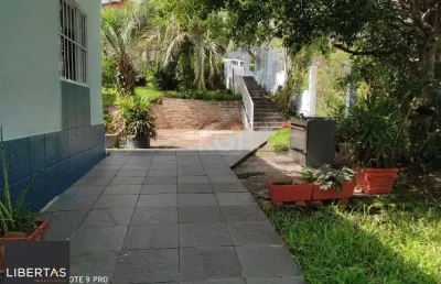 Casa com 3 quartos à venda na Rua Padre João Batista Reus, 2798, Camaquã, Porto Alegre