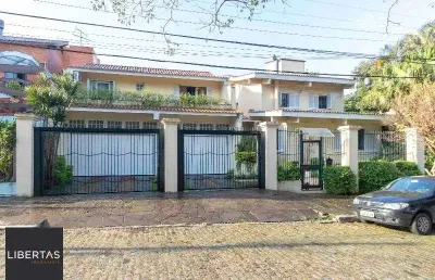 Casa para venda - 420m², 5 dormitórios, sendo 2 suites, 6 vagas - nonoai