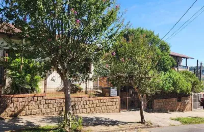 Casa com 3 quartos à venda na Rua Atílio Supertti, 287, Vila Nova, Porto Alegre