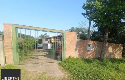 Casa com 2 quartos à venda na Beco da Vitória, 1541, Boa Vista do Sul, Porto Alegre