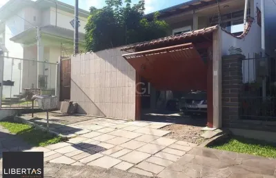 Casa com 3 quartos à venda na Rua José Pereira da Cunha, 49, Vila Nova, Porto Alegre