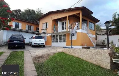 Casa com 4 quartos à venda na Rua José Alves de Castro, 468, Vila Nova, Porto Alegre