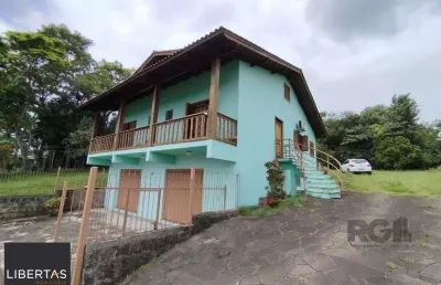 Casa com 3 quartos à venda na Avenida Santo Dias da Silva, 924, Lomba do Pinheiro, Porto Alegre