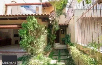 Casa com 4 quartos à venda na Rua Coronel Paulino Teixeira, 325, Rio Branco, Porto Alegre