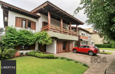 Casa em condomínio fechado com 4 quartos à venda na Avenida Jacuí, 747, Cristal, Porto Alegre