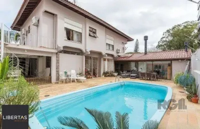 Casa com 3 quartos à venda na Avenida Montreal, 356, Jardim Lindóia, Porto Alegre