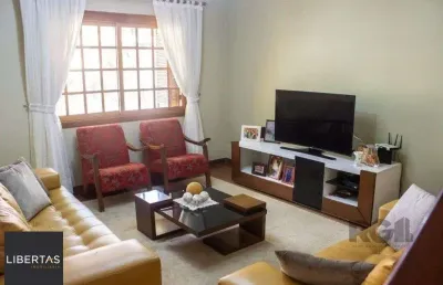 Casa com 4 quartos à venda na Rua Lola de Oliveira, 95, Parque Santa Fé, Porto Alegre