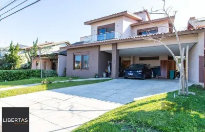 Casa em condomínio fechado com 4 quartos à venda na Avenida Juca Batista, 9000, Belém Novo, Porto Alegre