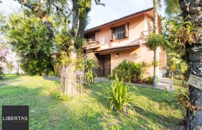 Casa com 4 quartos à venda na Rua Itapitocaí, 725, Cristal, Porto Alegre