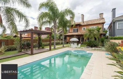Casa em condomínio fechado com 4 quartos à venda na Avenida Juca Batista, 9000, Belém Novo, Porto Alegre