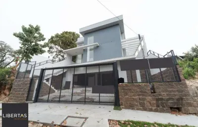 Casa com 3 quartos à venda na Rua Professor Emílio Meyer, 205, Vila Conceição, Porto Alegre