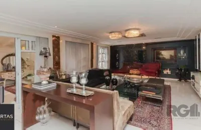Casa em condomínio fechado com 4 quartos à venda na Rua Attílio Bilibio, 120, Jardim Carvalho, Porto Alegre