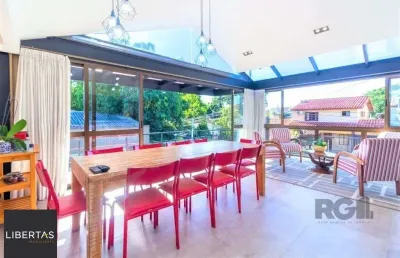 Casa com 4 quartos à venda na Rua Criciúma, 115, Guarujá, Porto Alegre