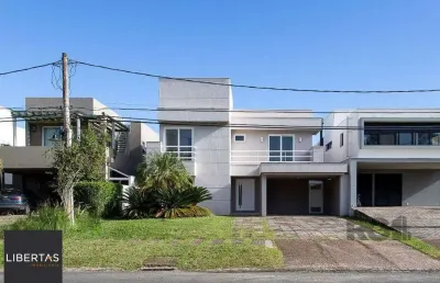 Casa em condomínio fechado com 4 quartos à venda na Avenida Juca Batista, Belém Novo, Porto Alegre
