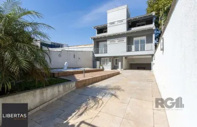 Casa com 4 quartos à venda na Avenida Nonoai, 724, Nonoai, Porto Alegre
