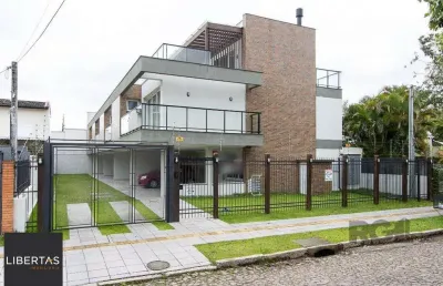 Casa em condomínio fechado com 3 quartos à venda na Avenida Pereira Passos, 695, Vila Assunção, Porto Alegre