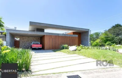 A casa le mans, uma residência térrea de esquina com 389,48m2 de área coberta