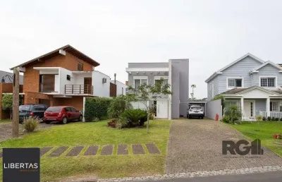 Casa em condomínio fechado com 3 quartos à venda na Avenida Juca Batista, 9000, Belém Novo, Porto Alegre
