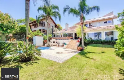 Casa em condomínio fechado com 3 quartos à venda na Avenida Firmino Octávio Bimbi, 255, Cavalhada, Porto Alegre