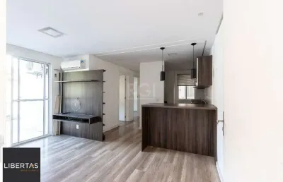 Apartamento 2 dormitórios , sala com dois ambientes , cozinha americana sacada com churrasqueira 1 vaga