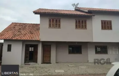 Casa em condomínio fechado com 3 quartos à venda na Rua Vereador Serapião Goulart, 693, Bela Vista, Alvorada