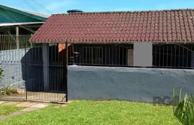 Casa 3 dormitórios, vaga de garagem, bairro vista alegre