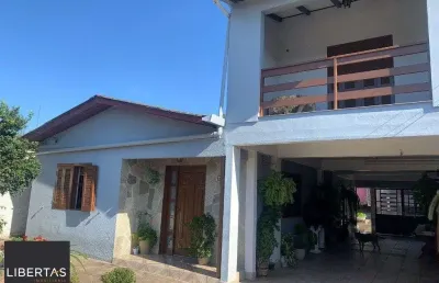 Casa com 4 quartos à venda na Rua Osvaldo Cruz, 159, Maringá, Alvorada