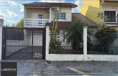 Casa com 4 quartos à venda na Rua Carlos Fraga, 46, Vila Márcia, Cachoeirinha
