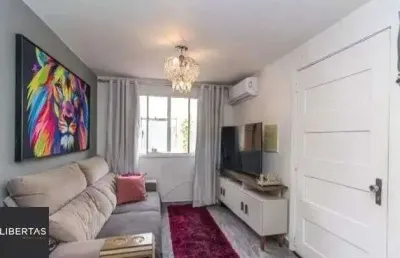 Casa em condomínio fechado com 2 quartos à venda na Rua Tenente Ary Tarrago, 1720, Jardim Itu Sabará, Porto Alegre