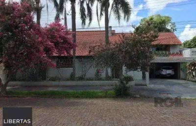 Casa com 4 quartos à venda na Avenida Cinco de Novembro, 109, Teresópolis, Porto Alegre