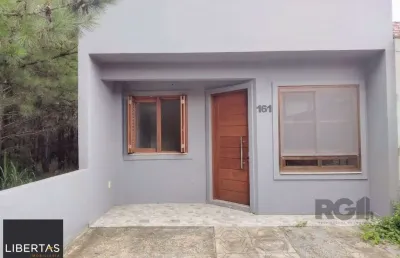 Casa térrea - 2 dormitórios, área coberta com churrasqueira , terraço - 02 vagas