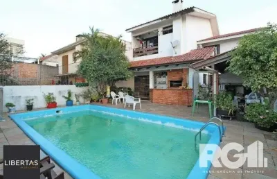 Casa com 3 quartos à venda na Rua Senegal, 230, Vila Ipiranga, Porto Alegre