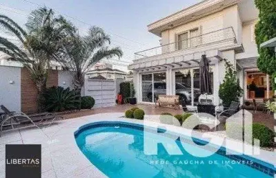 Casa com 3 quartos à venda na Rua Irmão Adão Rui, 544, Marechal Rondon, Canoas