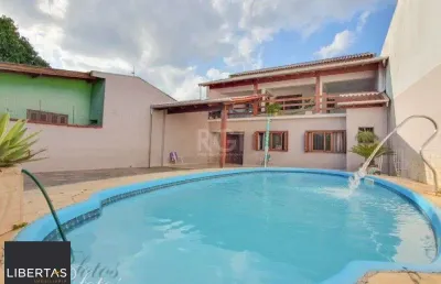 Ótima casa com 5 dormitórios no bairro rio branco em canoas