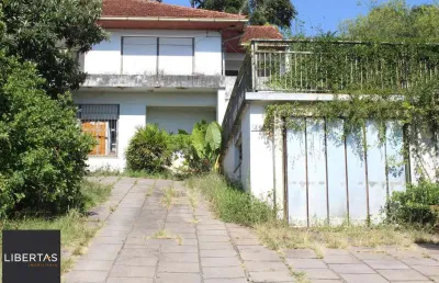 Casa com 4 quartos à venda na Avenida Guaíba, 4274, Vila Assunção, Porto Alegre