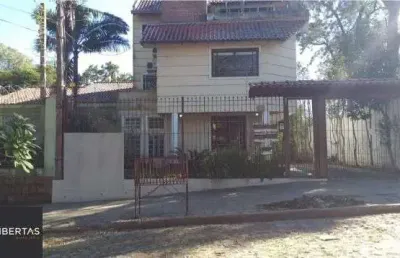 Casa em condomínio fechado com 4 quartos à venda na Rua Upamaroti, 1129, Cristal, Porto Alegre